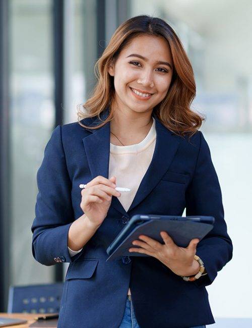 attractive-smiling-asian-businesswoman-standing-ho-NP7QNNM.jpg